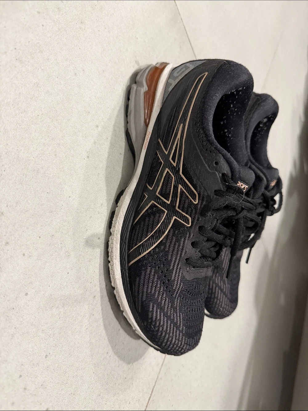 Asics Black Sneakers with Copper Accents